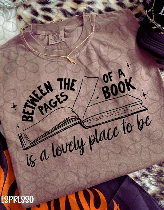Between The Pages Of A Book Is A Lovely Place To Be Completed Tee