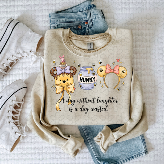 A day without laughter is a day wasted Completed Tee