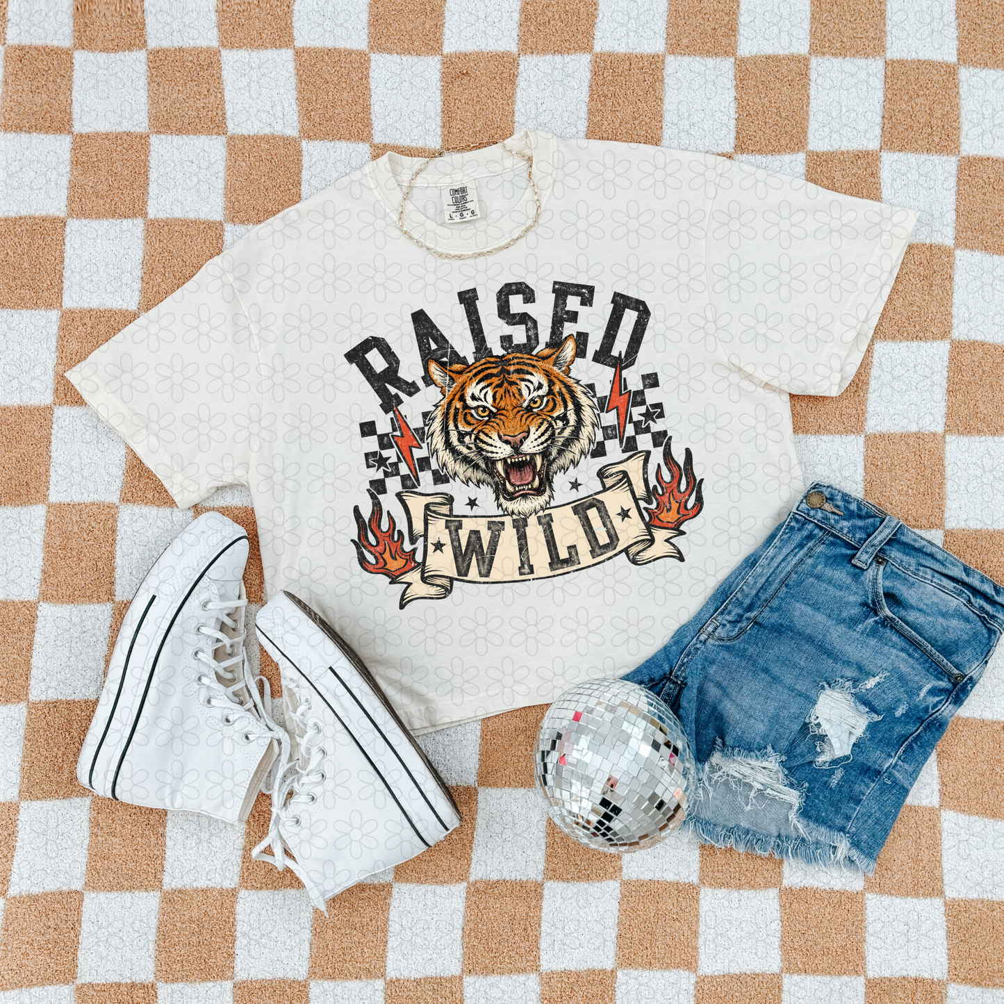 Raised Wild Completed Tee