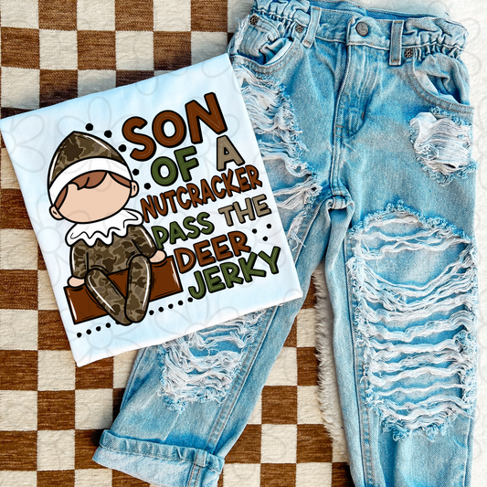 Son Of A Nutcracker Pass The Deer Jerky Completed Tee