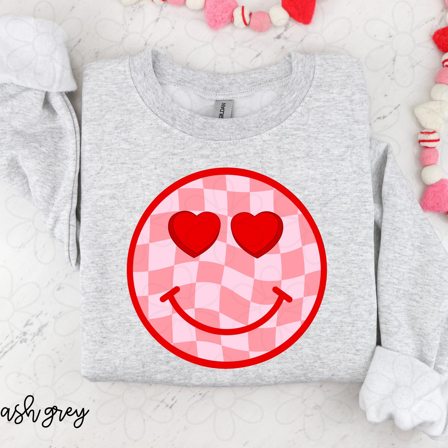 Checkered Heart Eye Smiley Completed Tee
